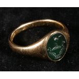 Modern 18ct gold signet ring set intaglio engraved bloodstone. 6 grams CONDITION REPORT: Size S