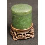 Chinese early 20th century mottled dark green spinach jade box and domed cover of circular