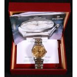 Tudor Oyster gents bi-coloured wristwatch, the champagne dial with day and date apertures, baton