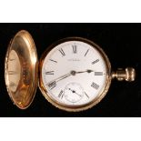 Victorian 18ct gold Waltham & Co keyless wind hunter pocket watch in a floral engraved case with