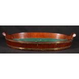 George III oval brass bound mahogany tray with two scrolling handles,