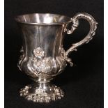Victorian silver christening cup with embossed flowers, acanthus cast handles and serpentine foot,