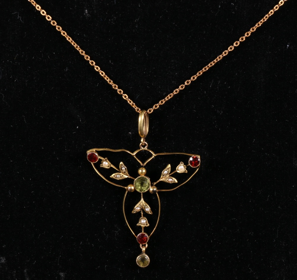 Edwardian 9ct gold peridot, seed pearl and garnet trefoil pendant, on a 9ct belcher chain. 24cm long