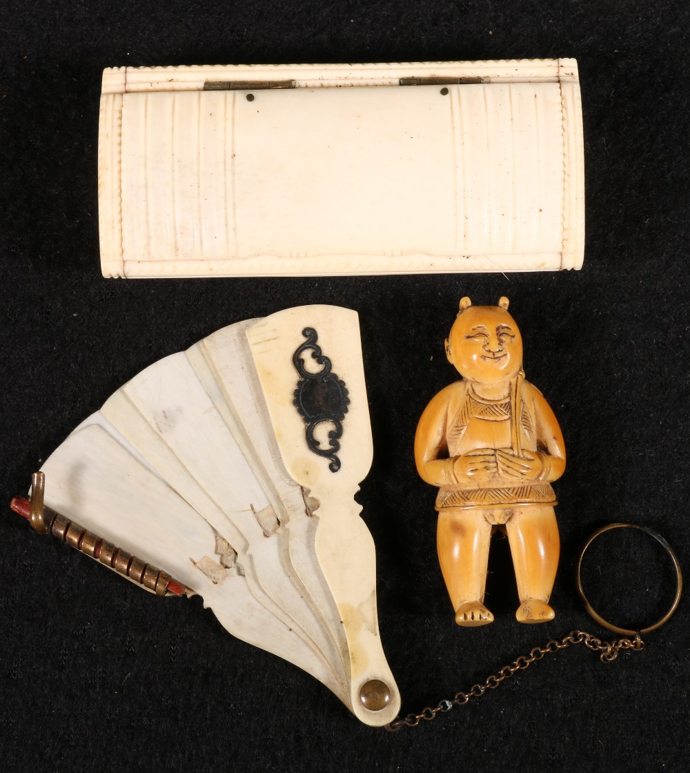 A 19th century Chinese carved ivory figure, an Anglo Indian rectangular carved snuff box 8.