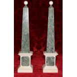 Modern pair of mottled green and white marble obelisks on plinth bases, 57cm.