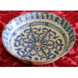 18th or early 19th century blue and white Delft bowl with flowerhead decoration,