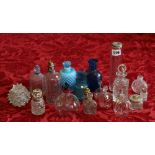 Nineteen various glass toilet jars and perfume bottles including an enamel glass Laura Ashley No 1