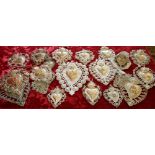 Large quantity of silver coloured metal ex voto,