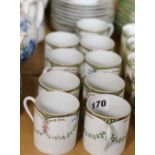 Limoges coffee set with green swag decoration comprising nine coffee cans,