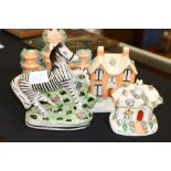 Extra Lot
Staffordshire style zebra model and three model houses