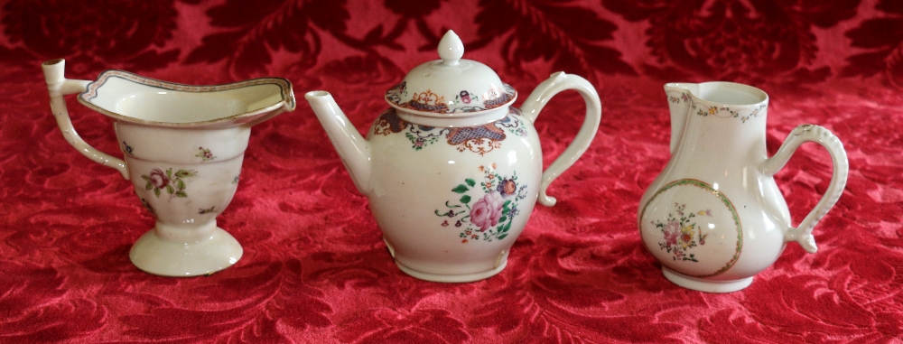 18th century Chinese famille rose teapot with floral decoration, 7cm, a 'silver shape' famille