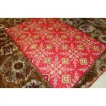 Arts and Crafts style Victorian tapestry rug, the red ground with lozenge and scrolling flowers, 2.