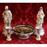 Pair of 19th century Continental porcelain figures of Turks, 38cm, a Samson armorial bowl, 12cm