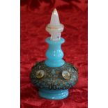Victorian blue glass bottle and stopper with metal overlaid fretwork and painted scenes, 17cm,