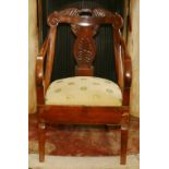 Regency mahogany armchair with acanthus top rail and anthemion carved splat