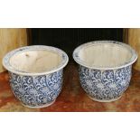 Pair of 19th century Chinese blue and white porcelain gold fish bowls of circular spiral fluted