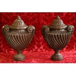 Pair of Louis XVI style faux prophyry plaster urns and covers, 58cm CONDITION REPORT: Both with