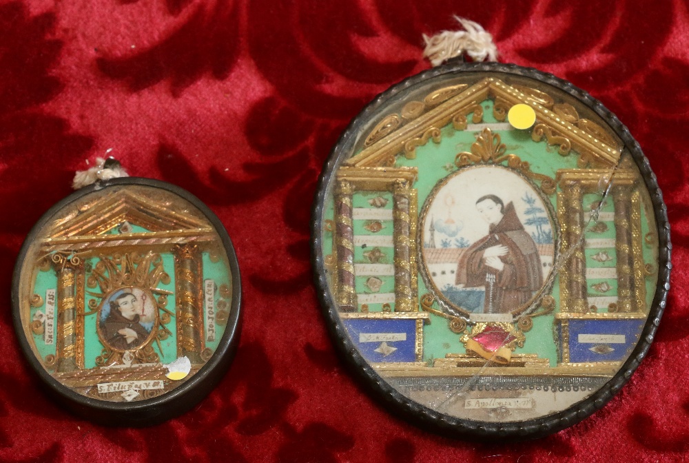 Two 19th century Italian reliquaries with watercolour miniatures of Saints in architectural mounts,