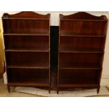 Pair of 20th century mahogany waterfall open bookcases on square tapered supports,