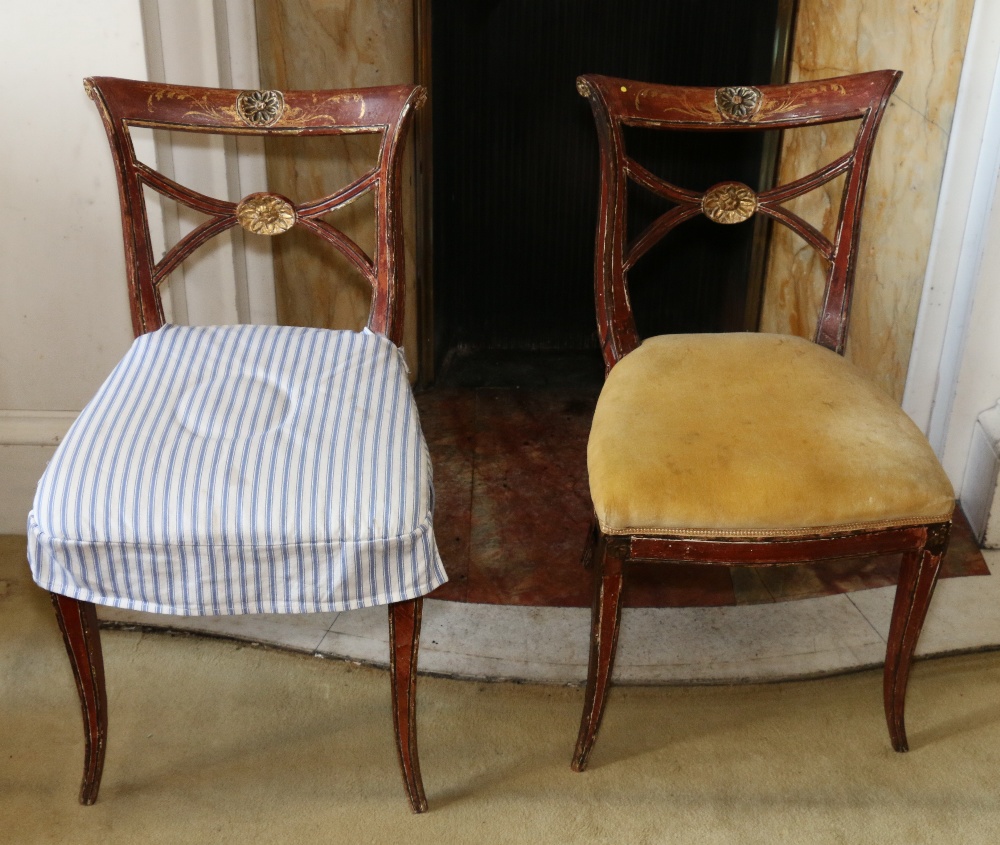 Pair of Regency parcel gilt painted pine dining chairs