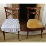 Pair of Regency parcel gilt painted pine dining chairs