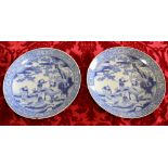 Pair of transfer printed blue and white dishes depicting figures in a garden.