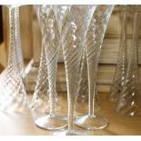 Set of eleven spiral champagne flutes CONDITION REPORT: Two with minor chip to rim