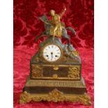 French Empire ormulu mounted clock, the Roman dial surmounted by a figure of Napoleon on horseback,
