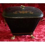 Toleware coal box of rounded rectangular tapering form raised on four paw feet, gilt floral