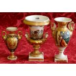 Two 19th century Paris gilt porcelain vases, 25cm together with an English gilt porcelain urn shaped