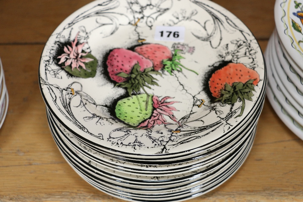 Set of twelve 20th century strawberry decorated dishes