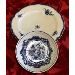 18th century English blue and white saucer with chinoiserie decoration and a Caughley style blue and