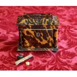 Victorian tortoiseshell and ivory two-division tea caddy of canted rectangular section with four