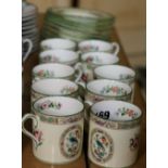 Wedgwood part coffee set with bird and floral decoration comprising ten coffee cans and eleven