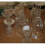 Set of four cut glass liqueur glasses, 8cm high, three Waterford Champagne flutes,