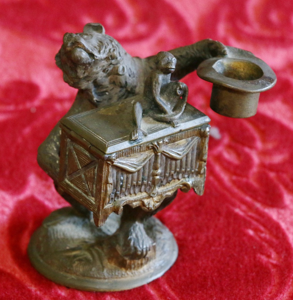 19th century Austrian bronze novelty vesta holder in the form of a bear carrying a casket,