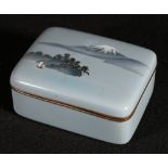 Wireless cloisonne box of rounded rectangular form,. the blue grey ground decorated with a scene