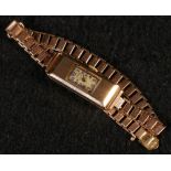 9ct gold wristwatch by T Brown of Liverpool on 9ct gold bracelet, 14.