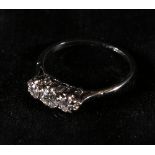 Platinum three stone diamond ring,