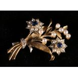 9ct gold sapphire and seed pearl brooch of floral spray form, makers stamp C & F CONDITION REPORT: