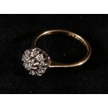 18ct gold nine stone diamond ring of flowerhead form