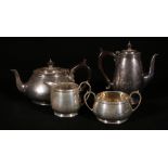 Silver four piece tea service maker Edward Barnard and Sons, of bulbous circular form,