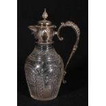 Victorian ep mounted cut glass claret jug with domed hinged cover over a mask spout and star cut