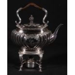 Victorian silver teapot on stand of fluted oval form, the stand with burner, Sheffield 1895, 945g