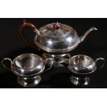 Silver three piece teaset of compressed spherical form with key pattern band, Birmingham 1930, 32oz.