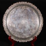 Edwardian silver tray of oval serpentine form with pierced border, Birmingham 1909,