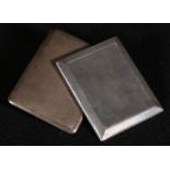 Two engine turned silver cigarette cases,