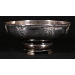 George VI silver pedestal bowl, the gadrooned rim cast with fruiting vines,