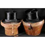 Two antique leather cased silk top hats, one for Hyum of Edinburgh, the other unnamed.