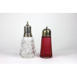 A silver topped and glass sugar caster W